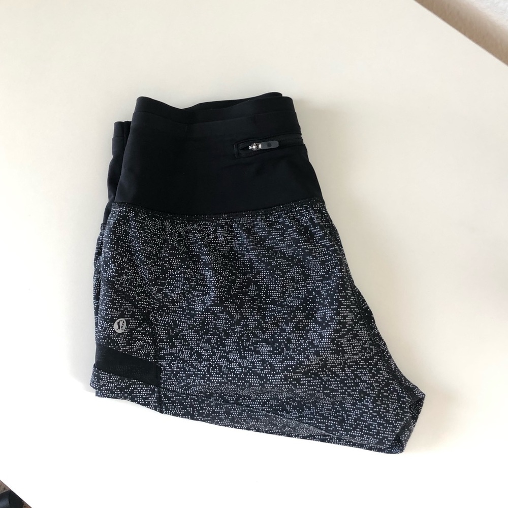 Lululemon size 4, high rise, b & w speckled shorts. 4 inches.